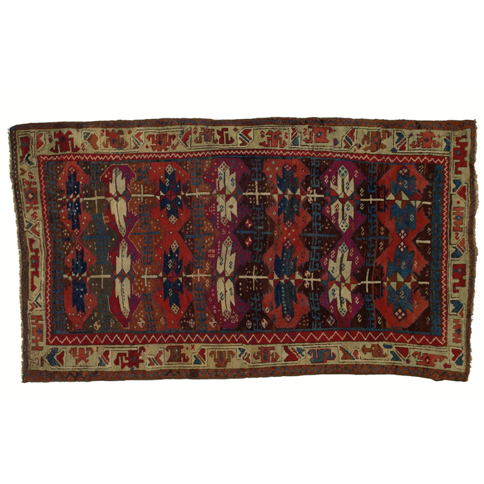 Appraisal: Turkish Yurok rug c colorful floral design with a tan