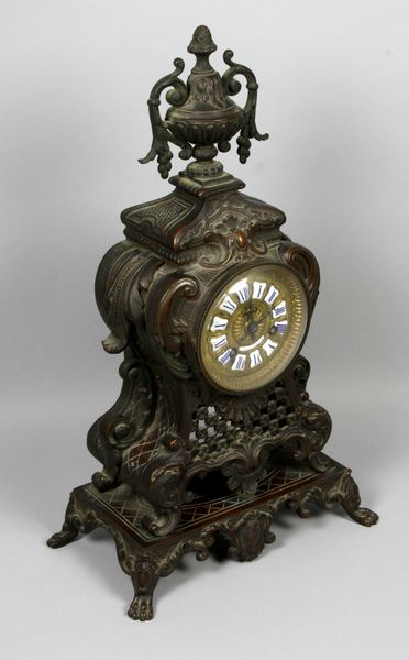 Appraisal: Tiffany Co New York bronze shelf clock with urn finial