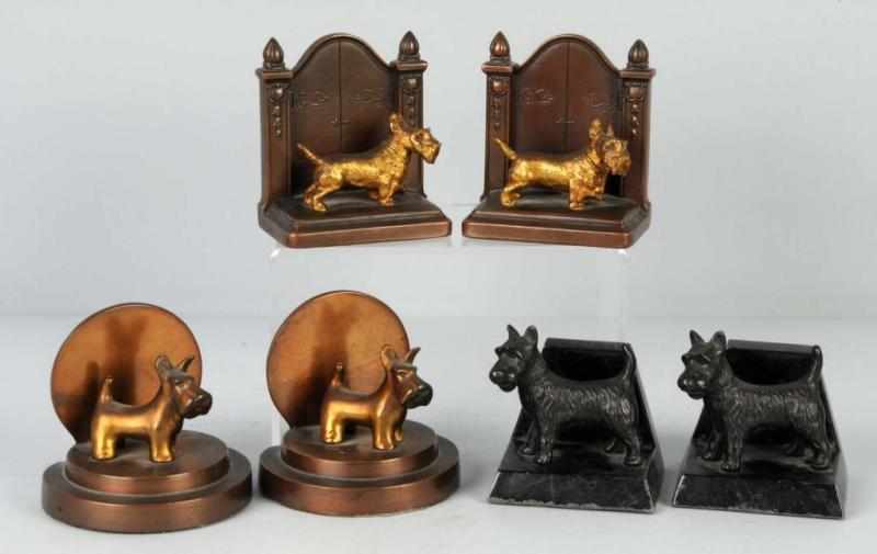 Appraisal: Lot of Pairs of Scottie Bookends Description Spelter Scotties on