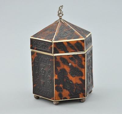 Appraisal: A Tortoise and Ivory Clad Tea Caddy Hexagonal shape with