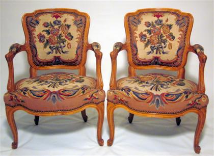 Appraisal: Pair Louis XV style needlework upholstered fauteils The channel molded