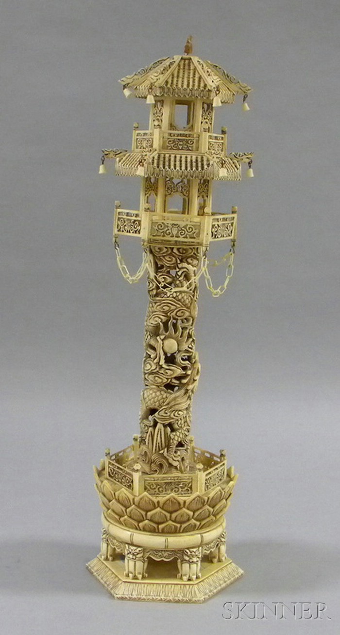 Appraisal: Asian Carved Bone Pagoda central dragon decorated cylinder with two