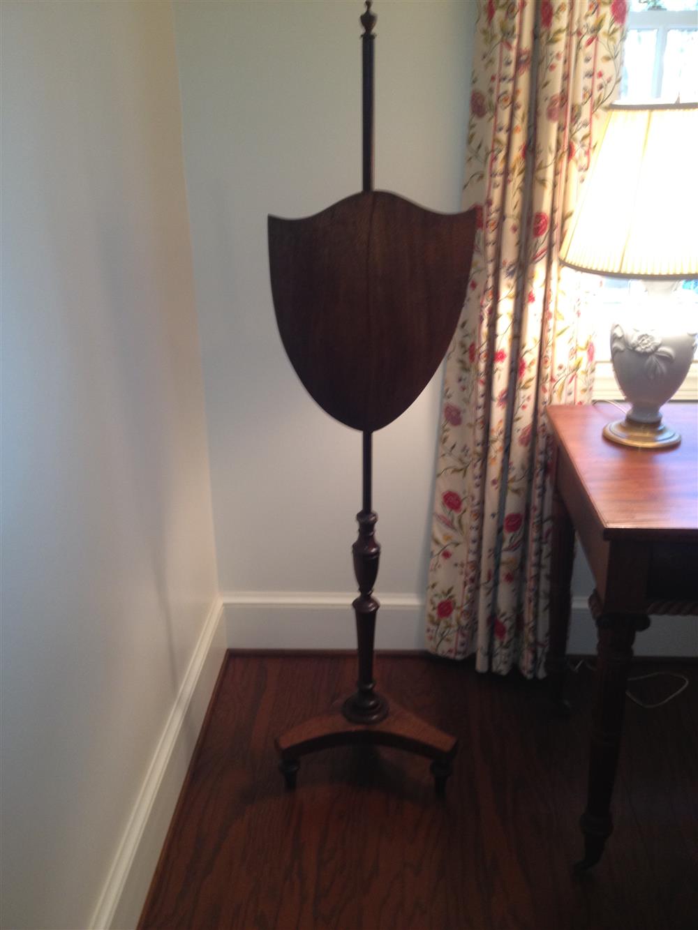 Appraisal: ENGLISH REGENCY SHIELD SHAPED MAHOGANY POLE SCREEN having an adjustable