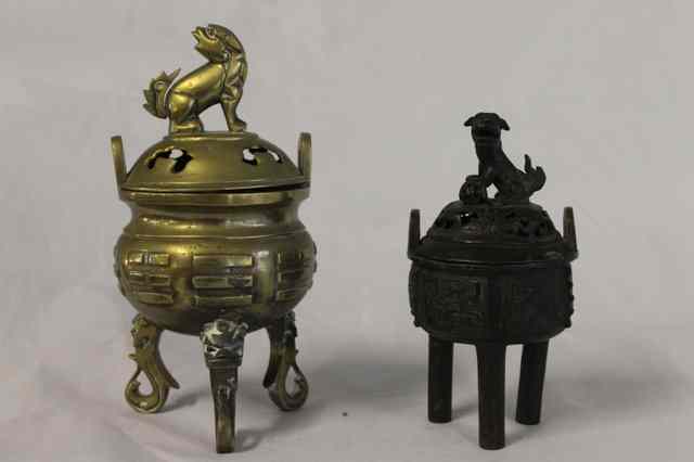 Appraisal: A CHINESE BRONZE INCENSE BURNER and cover decorated with eight