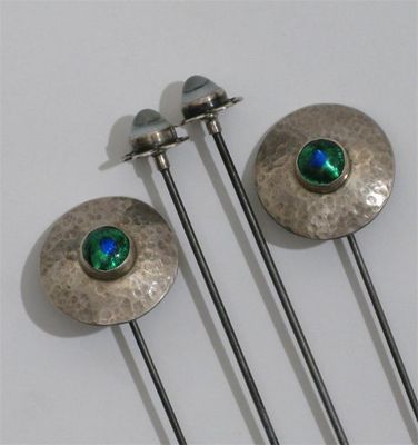 Appraisal: A pair of silver and enamel Arts and Crafts hatpins