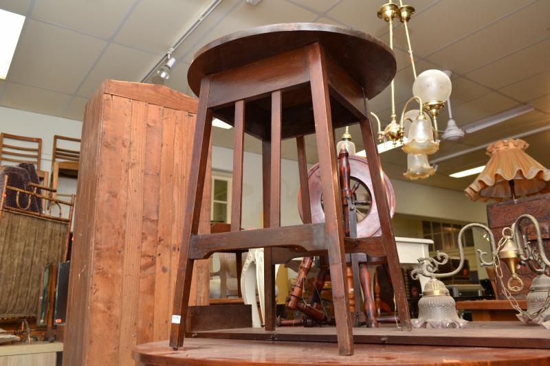 Appraisal: AN ARTS AND CRAFTS STYLE CIRCULAR SIDE TABLE WARPING TO