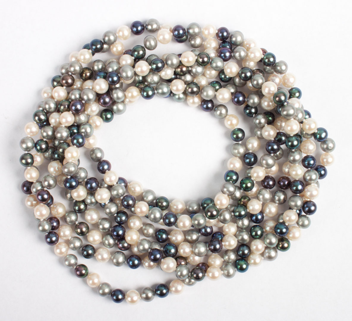 Appraisal: Lady's multi-color pearl opera length necklace in L composed of