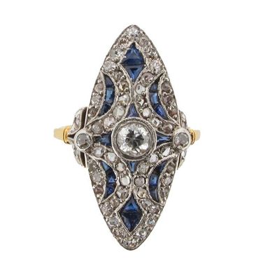 Appraisal: A sapphire and diamond set marquise shaped ring Centred with