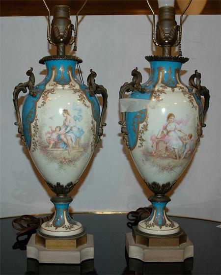 Appraisal: Pair of Sevres Style Bronze Mounted Porcelain Two-Handled Urns Estimate