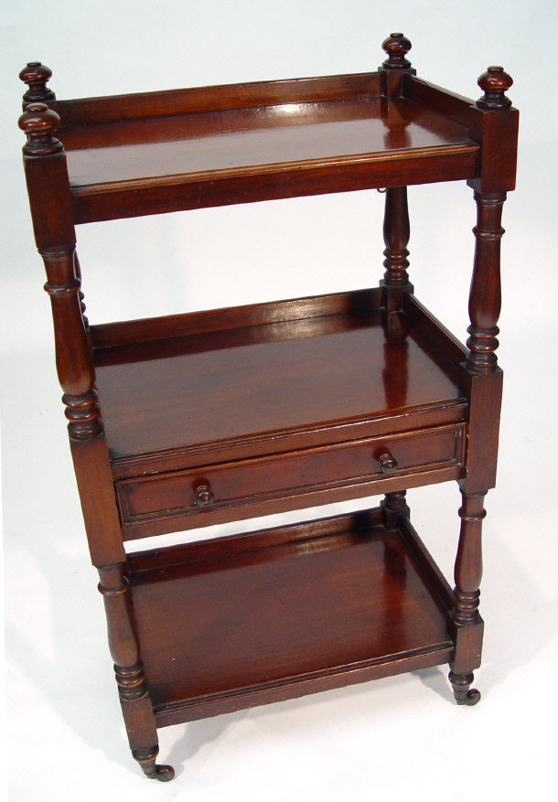 Appraisal: Victorian mahogany three tier buffet of small proportions fitted with