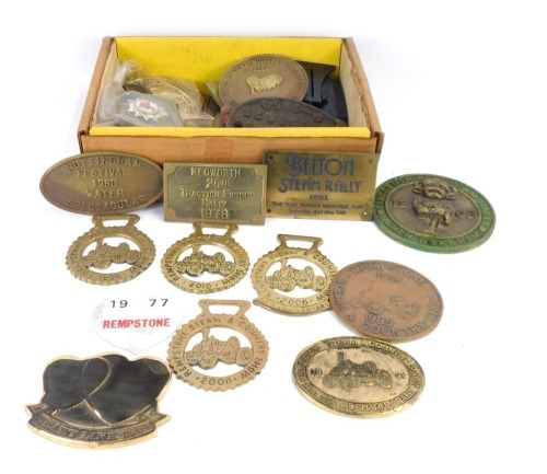 Appraisal: A quantity of steam rally brass badges and plaques for