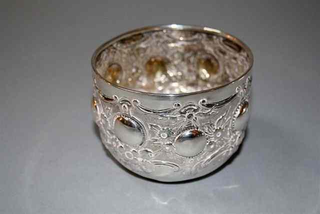 Appraisal: A VICTORIAN SILVER BOWL WITH CHASED FOLIATE DECORATION high London