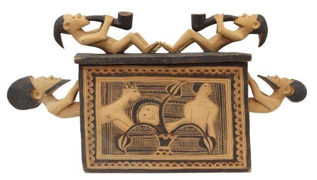 Appraisal: African carved wood box with applied black pigment lift-top lid