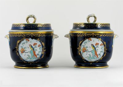 Appraisal: A pair of English porcelain ice pails and covers painted