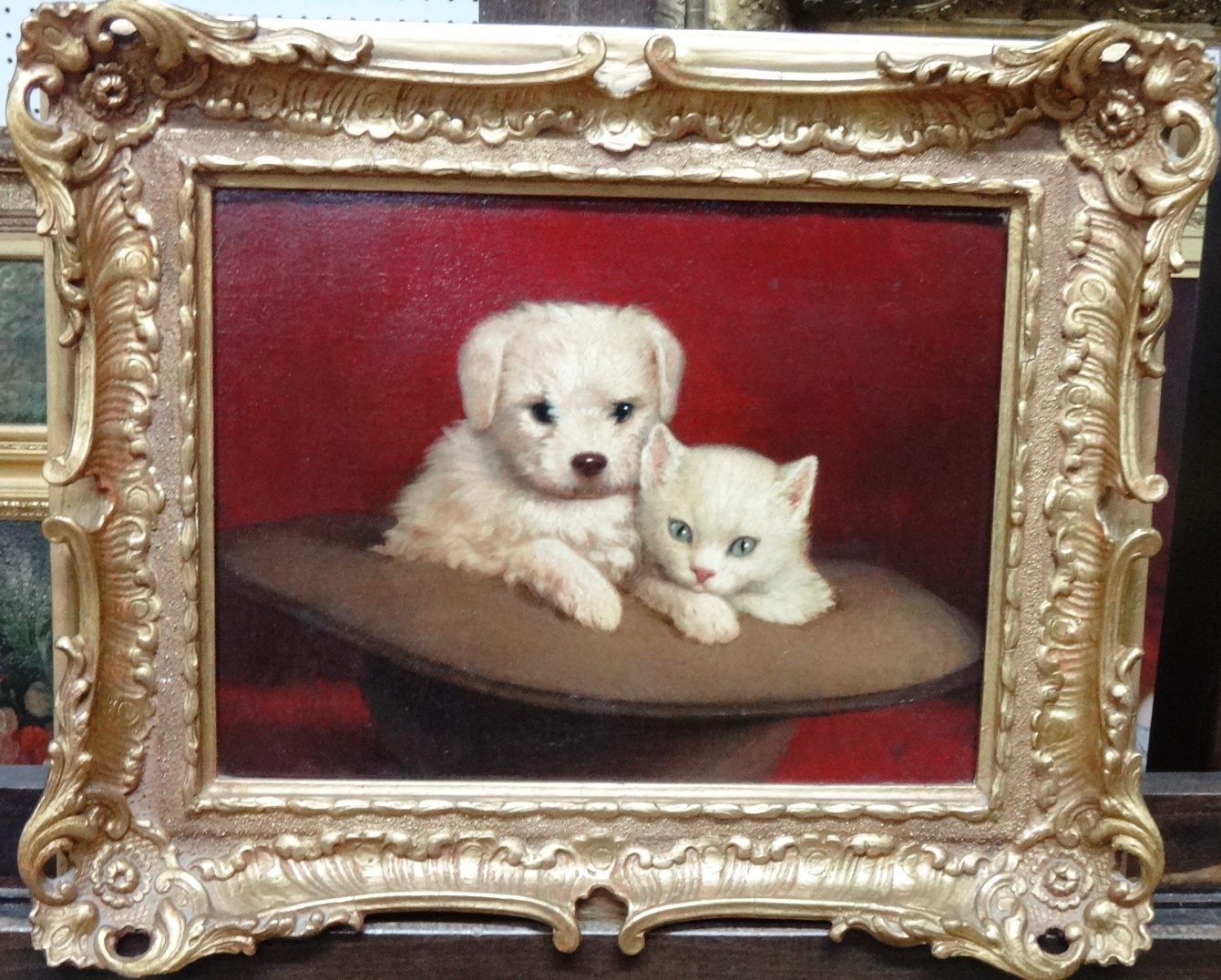 Appraisal: English School th century A puppy and kitten oil on