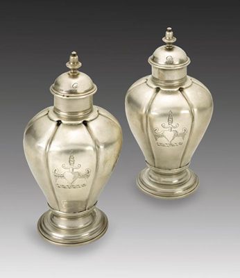 Appraisal: A pair of George II provincial tea canisters of segmented