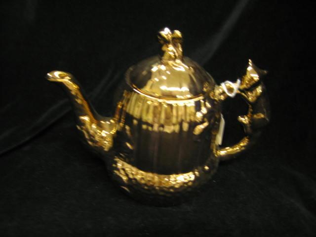 Appraisal: English Copperluster Teapot fox handle