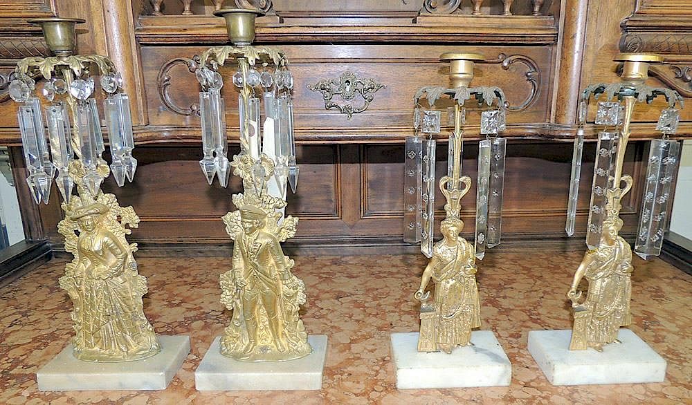 Appraisal: Bronze Dore Candelsticks All with figural supports on marble bases