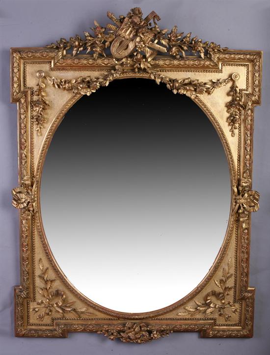 Appraisal: NEOCLASSICAL STYLE GILT-WOOD WALL MIRROR th century Crest with musical