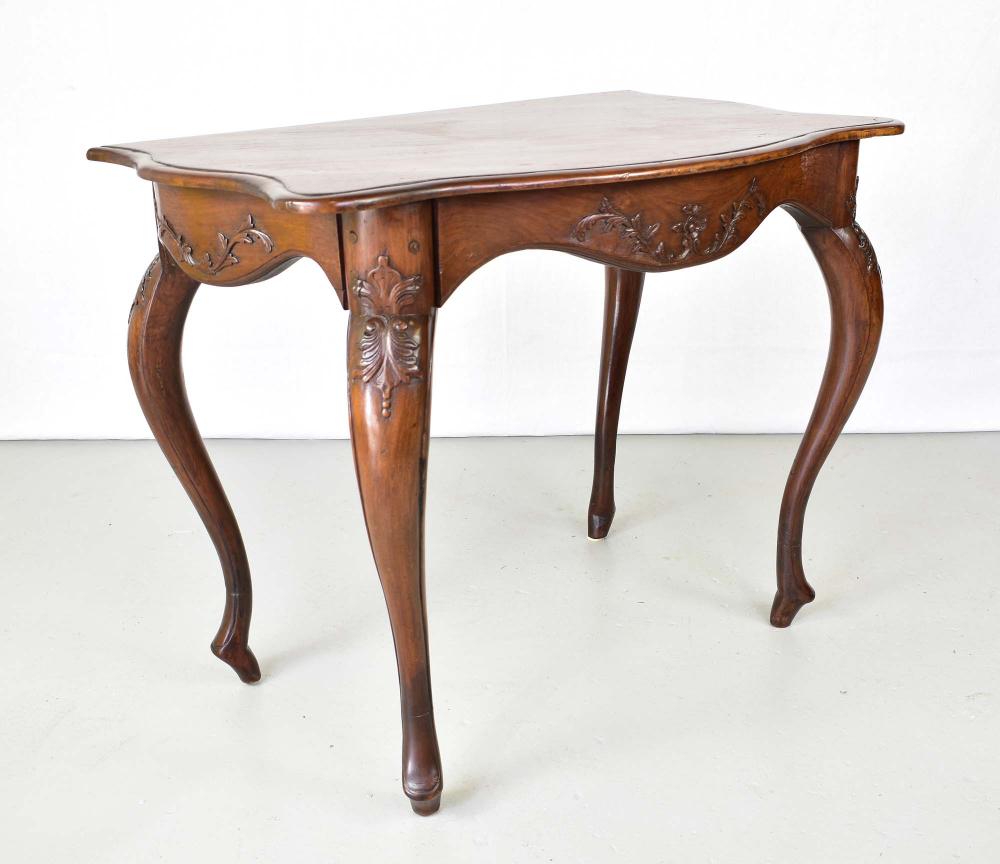 Appraisal: ITALIAN ROCOCO WALNUT SIDE TABLE th Century The shaped top