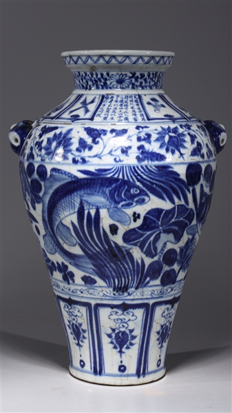 Appraisal: Chinese blue and white porcelain vase with molded mask handles