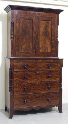 Appraisal: AN EARLY VICTORIAN MAHOGANY CUPBOARD ON CHEST the moulded cornice