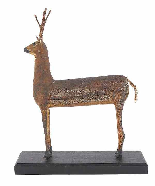 Appraisal: Folk art carved and painted figure of a deer th