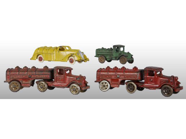 Appraisal: Lot of Cast Iron Gasoline Truck Toys Description Two AC