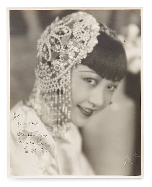 Appraisal: An Anna May Wong signed black and white photograph s