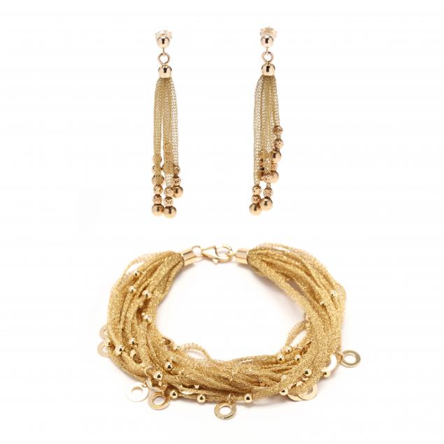 Appraisal: GOLD MESH BRACELET AND EARRINGS The multi-strand mesh gold bracelet