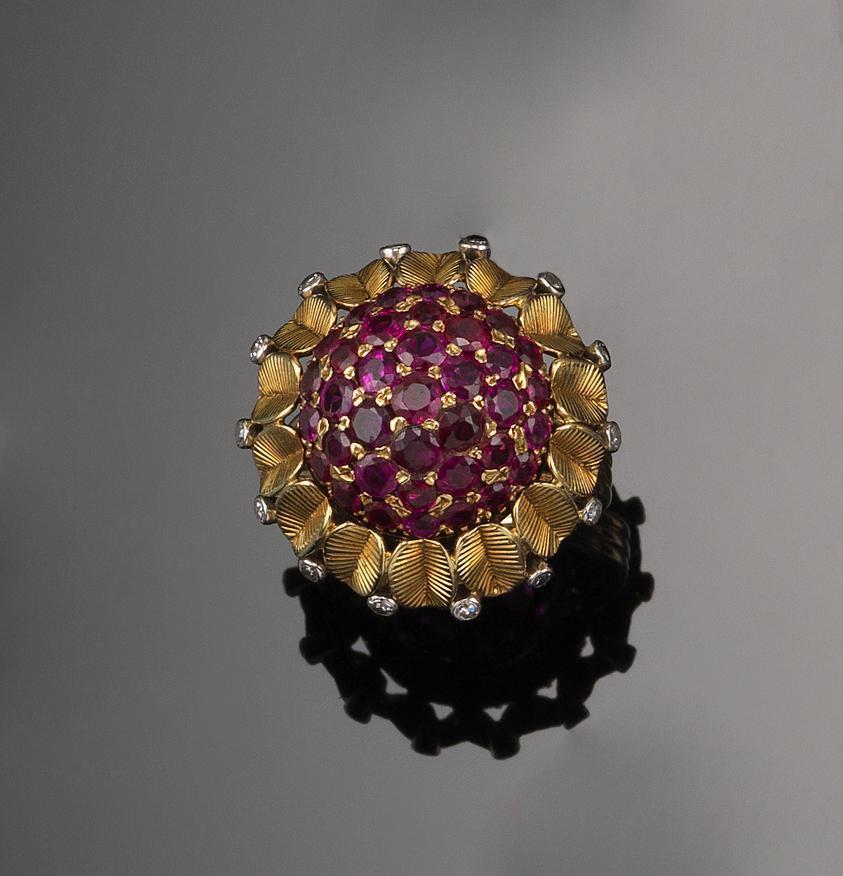 Appraisal: A ruby and diamond set gold bombe ring