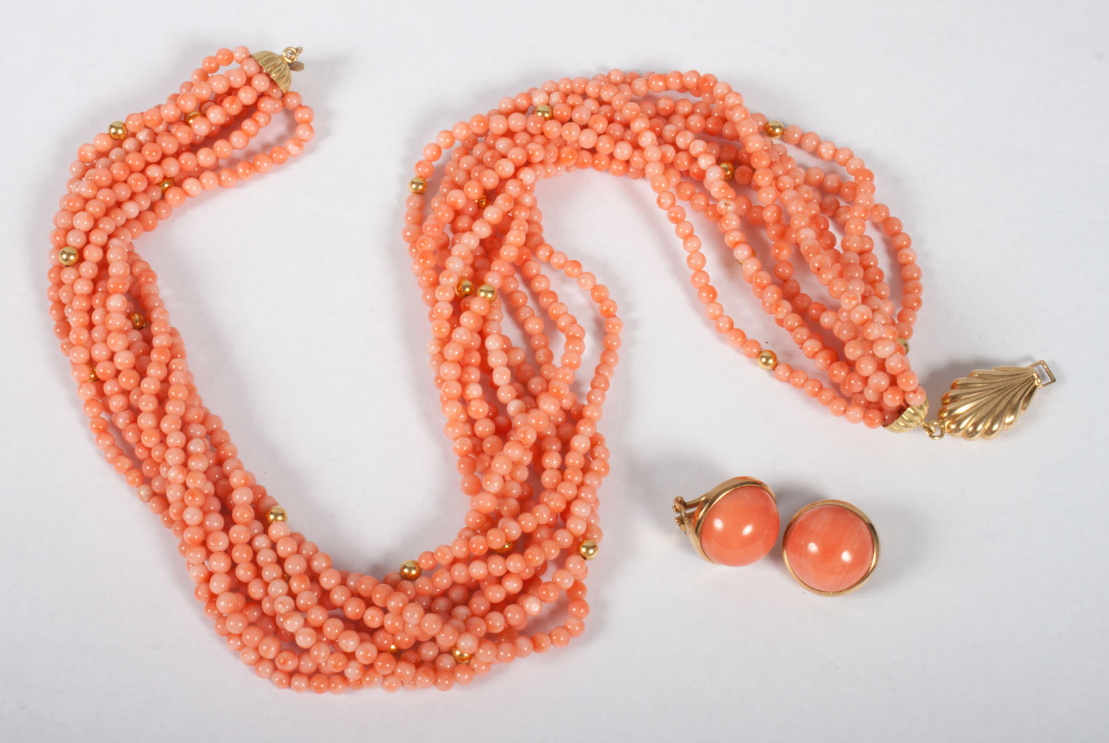 Appraisal: Pink coral and gold necklace matching earrings pink coral gold