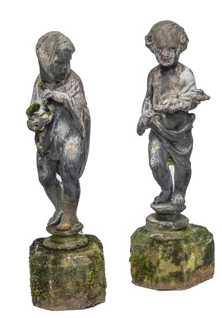 Appraisal: A pair of th century lead figures of children on