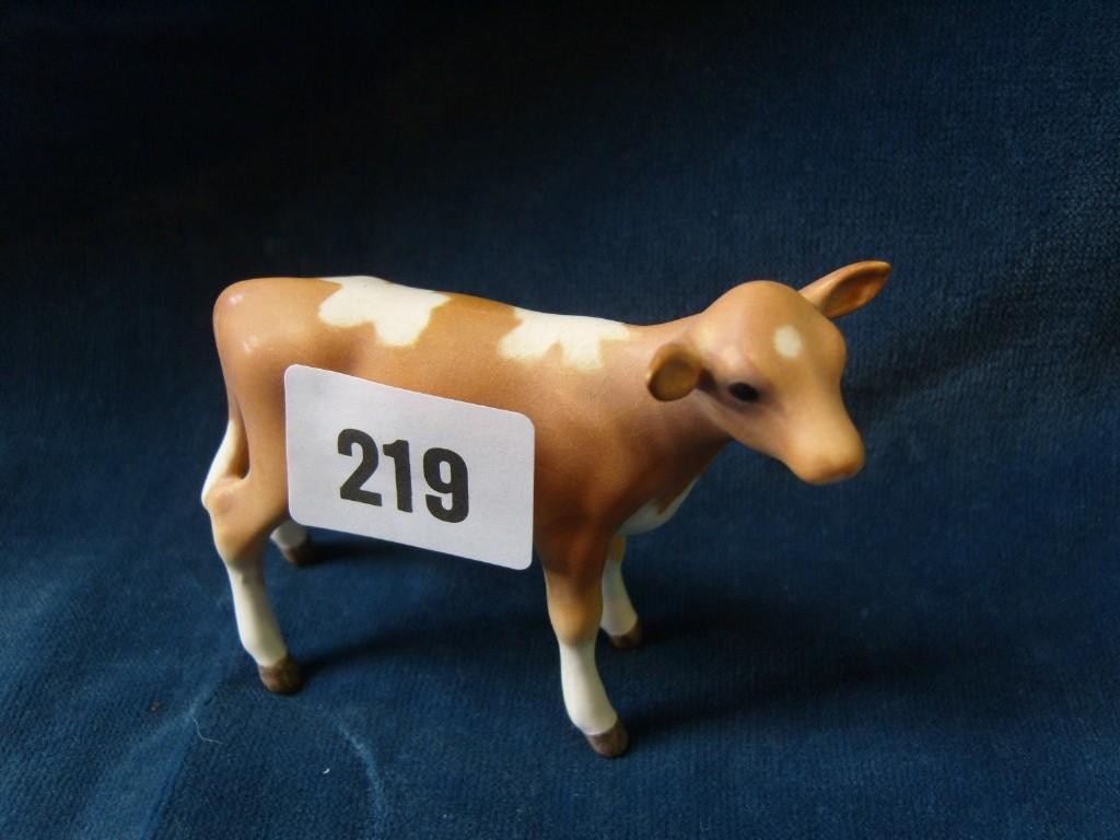 Appraisal: A Beswick matt glazed model of a Jersey calf -