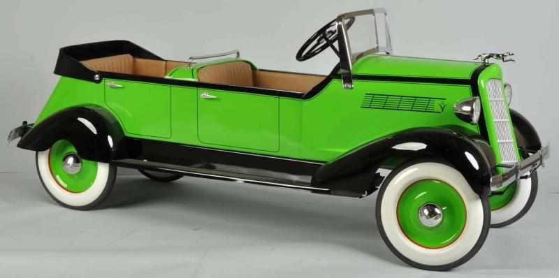 Appraisal: Pressed Steel Custom Built Ford Pedal Car Toy Description This