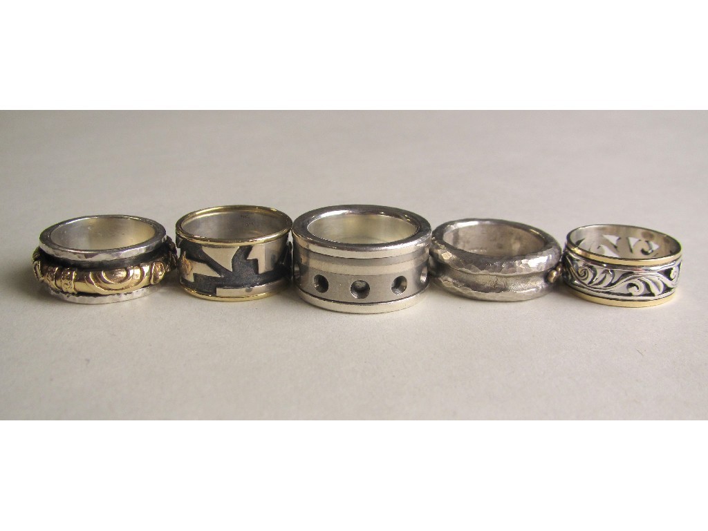 Appraisal: Five silver dress rings