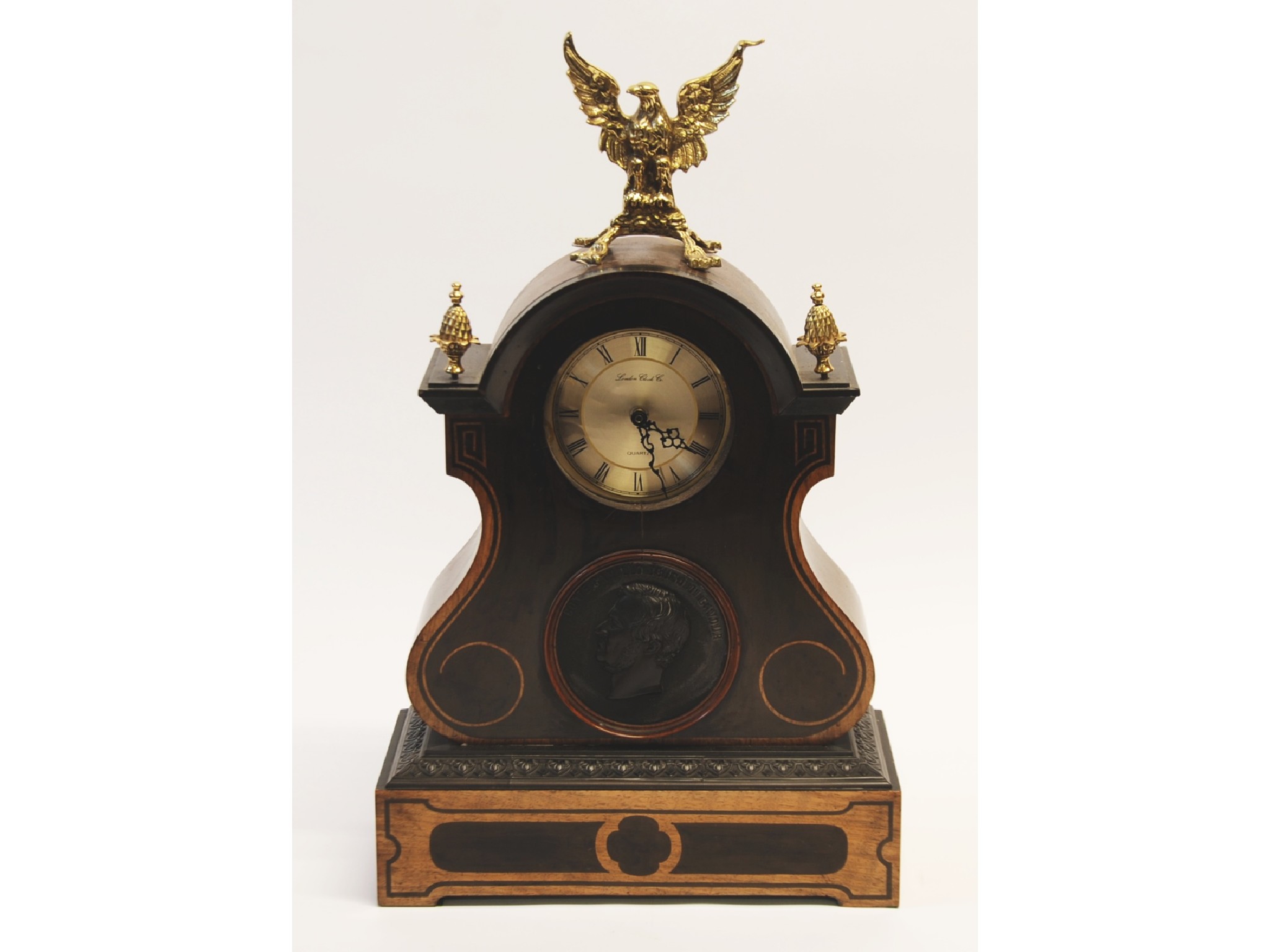 Appraisal: EARLY TWENTIETH CENTURY CONTINENTAL WALNUTWOOD AND BLEACHED WALNUT MANTEL CLOCK