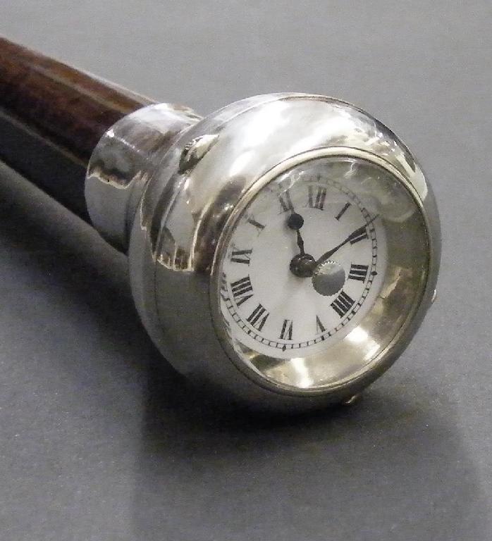 Appraisal: Good snake wood watch walking cane with a silver bezel