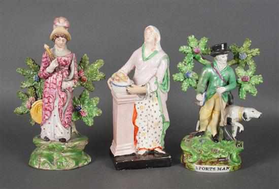 Appraisal: Pair of Prattware figures and a similar classical style figure