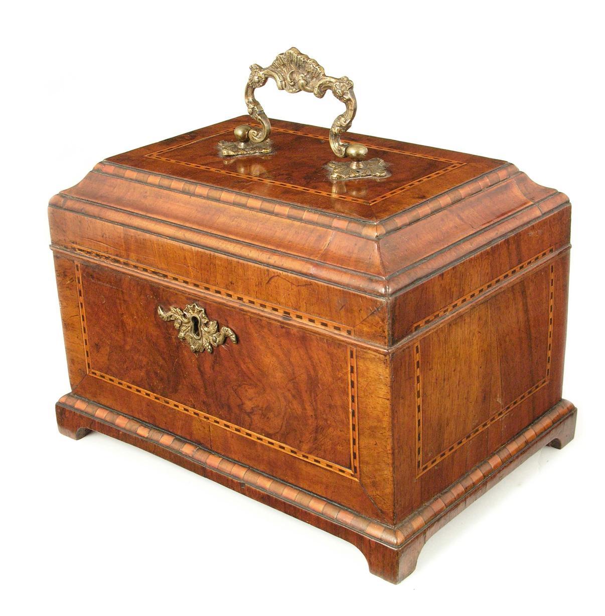 Appraisal: A George II walnut tea chest