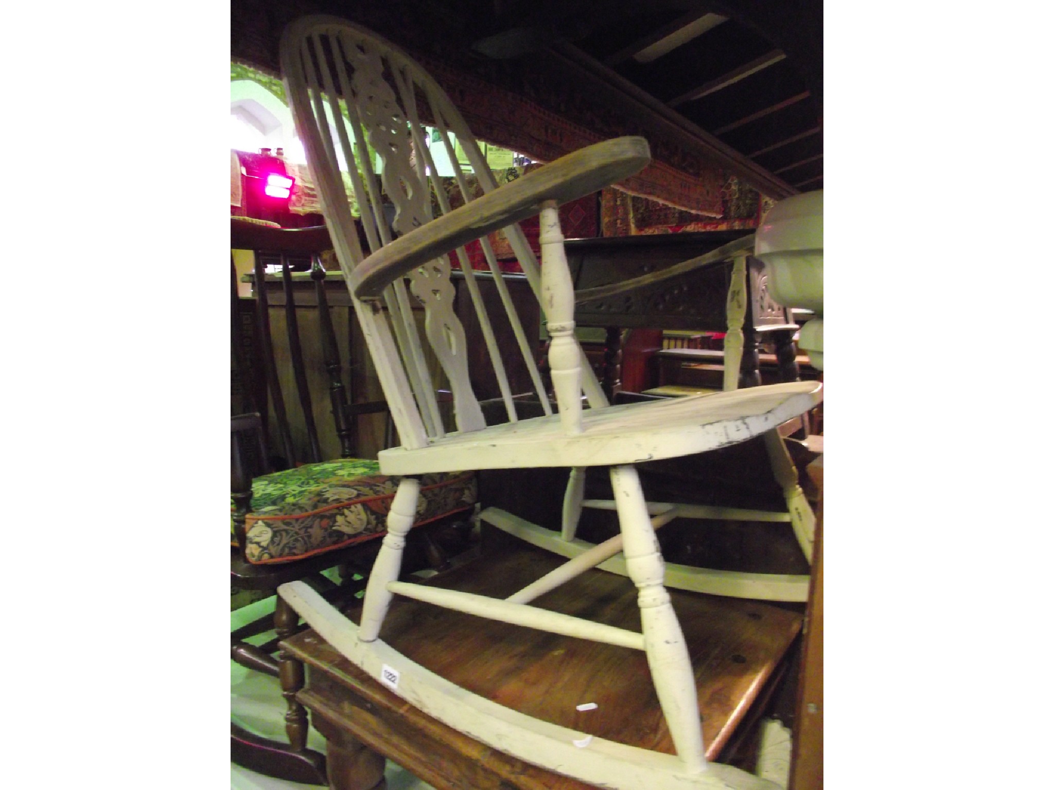 Appraisal: A Windsor style high hoop and stick back rocking chair