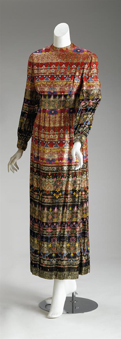 Appraisal: Malcolm Starr metallic patterned gown s Floral bohemian print on