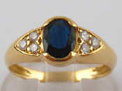 Appraisal: A yellow metal tests carat gold sapphire and diamond ring