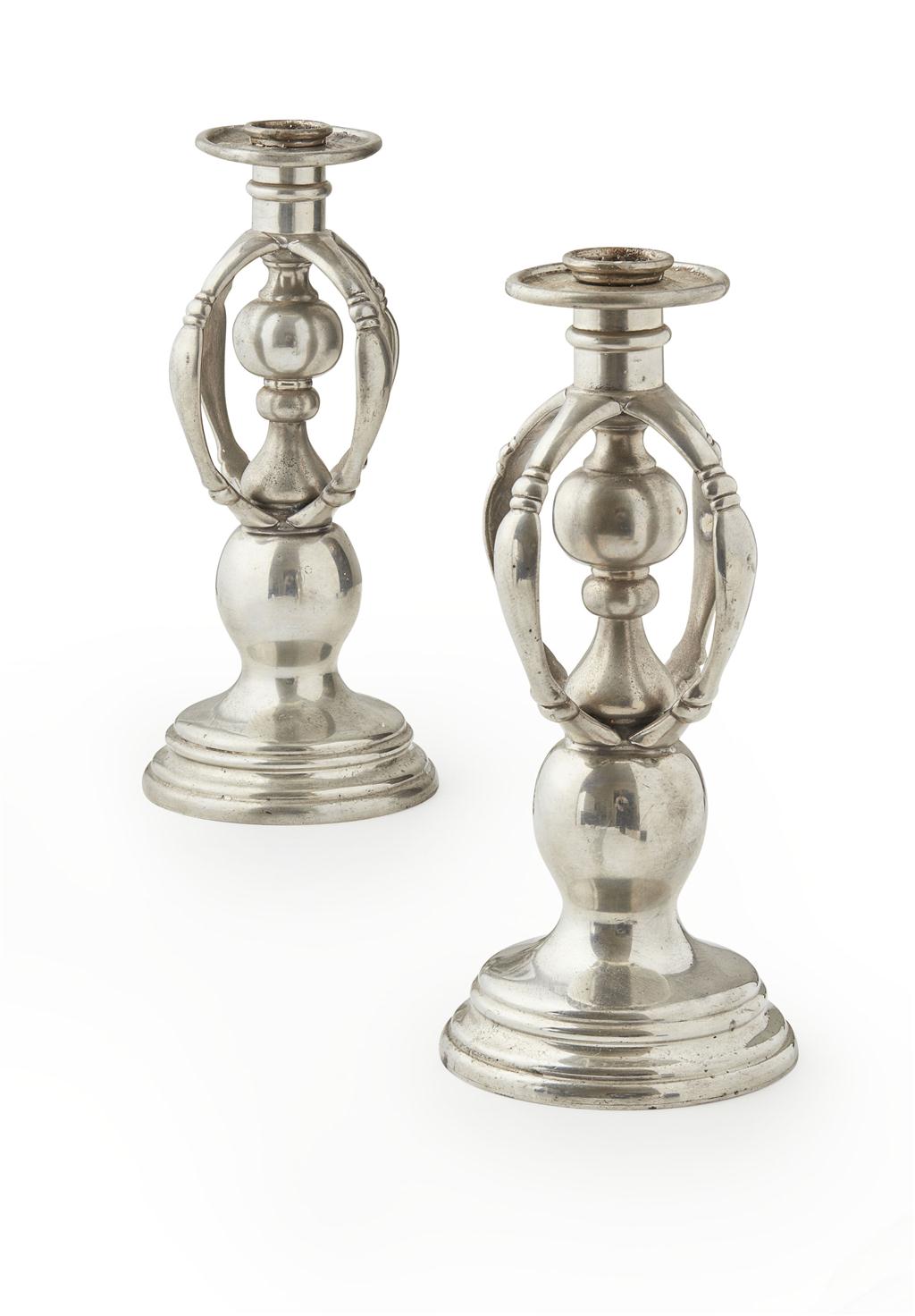 Appraisal: LIBERTY CO LONDON PAIR OF 'TUDRIC' POLISHED PEWTER CANDLESTICKS CIRCA