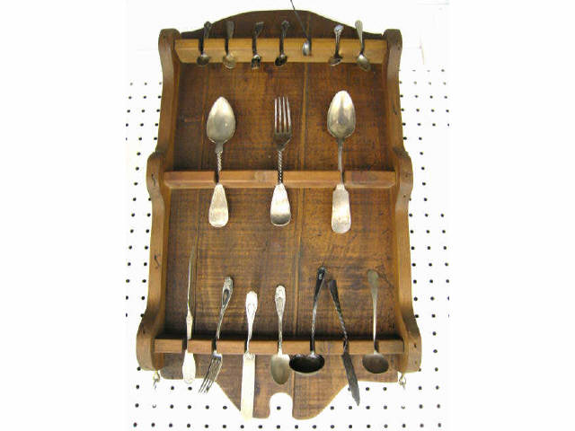 Appraisal: Wall Spoon Rack with contents including coin silver sterling silverplate