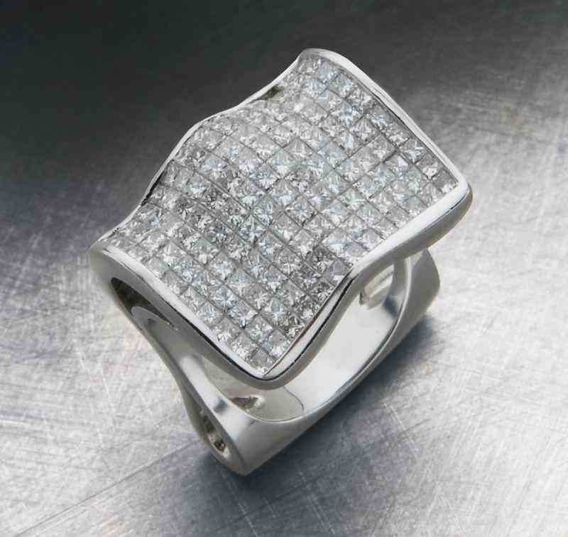 Appraisal: K white gold and diamond dinner ringhaving princess cut diamonds