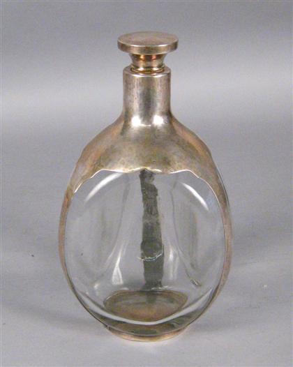 Appraisal: Sterling silver mounted decanter th century The triangular glass decanter