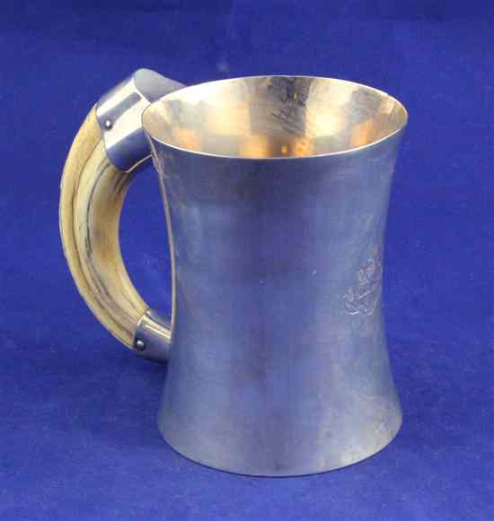 Appraisal: A late Victorian silver mug with ivory tusk handle of