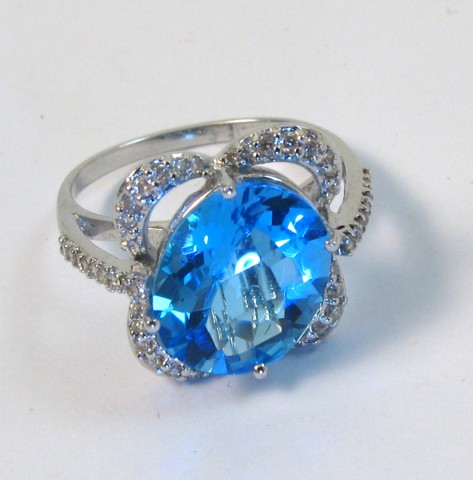 Appraisal: BLUE TOPAZ AND DIAMOND RING The k white gold band