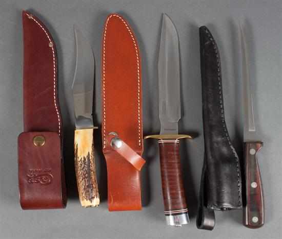 Appraisal: Three large hunting knives by Case Classic Knives and an